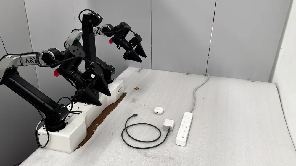 ARX AC One robot connecting a charger and an earphone case